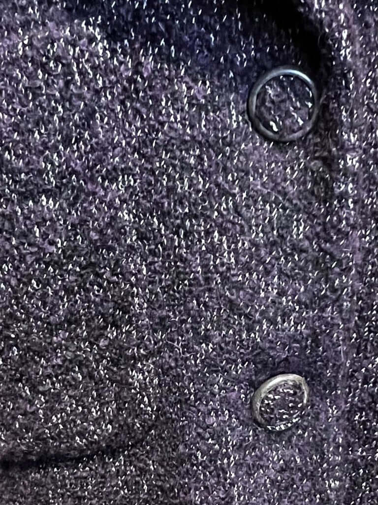 The CHANEL Wool/Cashmere Blend Overcoat with a Detached Scarf is a refined and timeless outerwear piece, combining the warmth of wool and cashmere for ultimate comfort. The detachable scarf adds versatility, allowing for various styling options while maintaining the coat’s sophisticated, elegant silhouette.