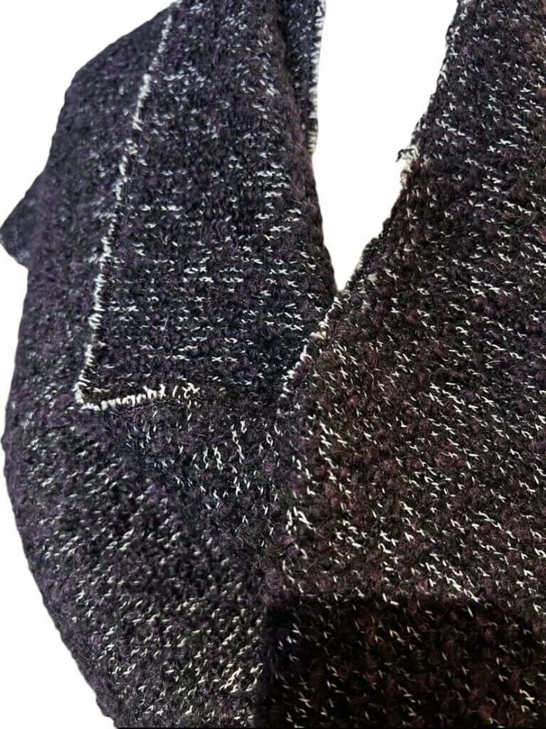 The CHANEL Wool/Cashmere Blend Overcoat with a Detached Scarf is a refined and timeless outerwear piece, combining the warmth of wool and cashmere for ultimate comfort. The detachable scarf adds versatility, allowing for various styling options while maintaining the coat’s sophisticated, elegant silhouette.