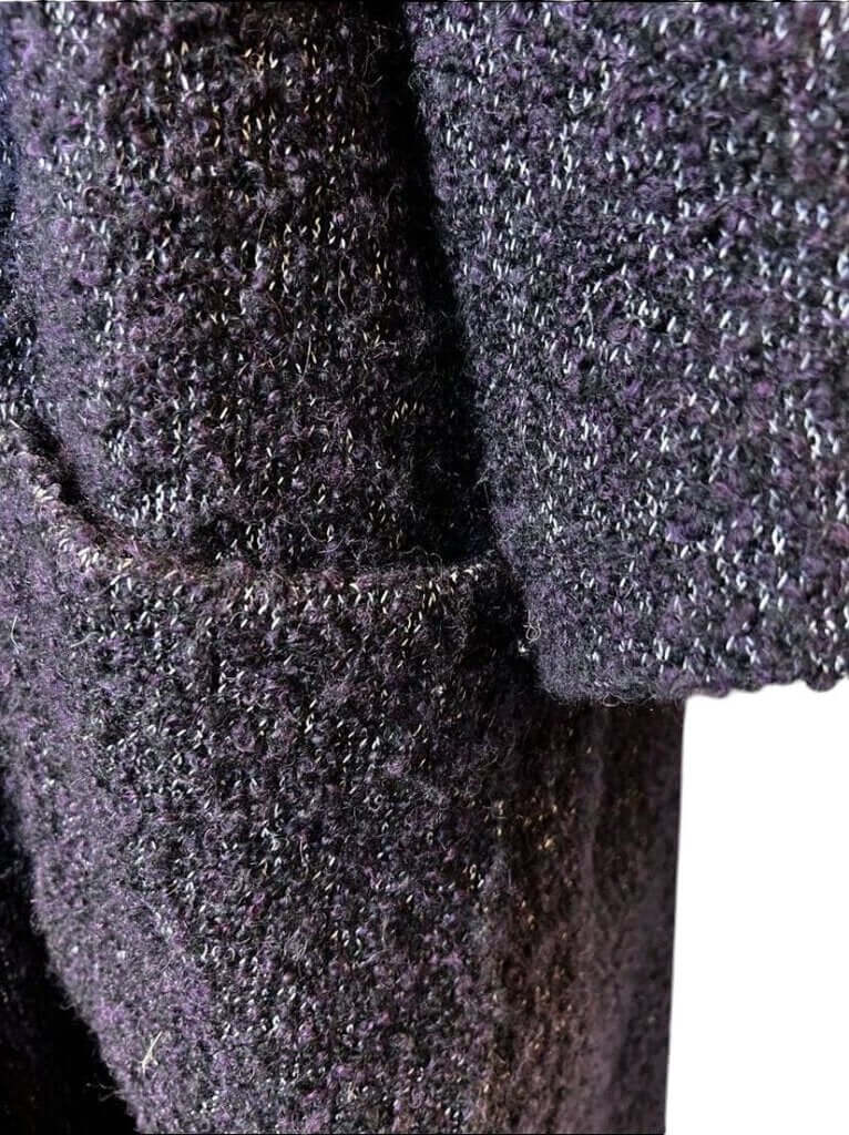 The CHANEL Wool/Cashmere Blend Overcoat with a Detached Scarf is a refined and timeless outerwear piece, combining the warmth of wool and cashmere for ultimate comfort. The detachable scarf adds versatility, allowing for various styling options while maintaining the coat’s sophisticated, elegant silhouette.
