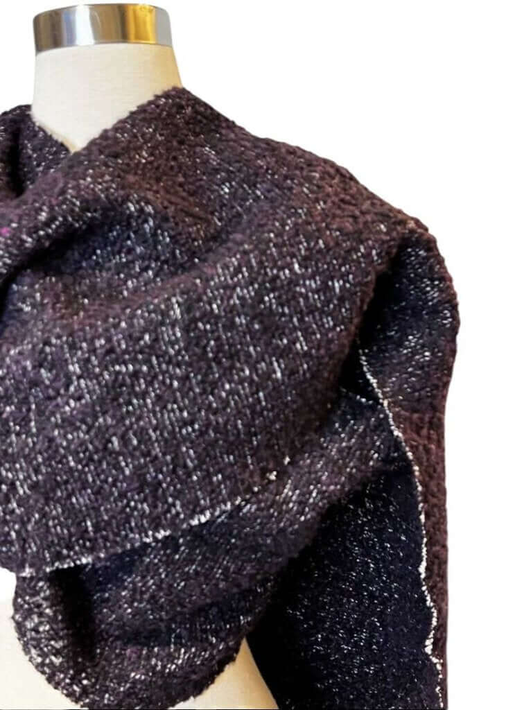 The CHANEL Wool/Cashmere Blend Overcoat with a Detached Scarf is a refined and timeless outerwear piece, combining the warmth of wool and cashmere for ultimate comfort. The detachable scarf adds versatility, allowing for various styling options while maintaining the coat’s sophisticated, elegant silhouette.