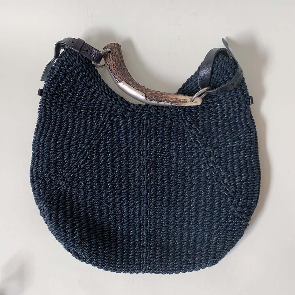 Katybird is a consignment boutique in Madrona, Seattle offering authentic YSL cardigans, blouses, dresses, cashmere, sweaters, outerwear, accessories, handbags, shoes, and much more. YSL Collab With Tom Ford Black Mombasa Woven Handbag