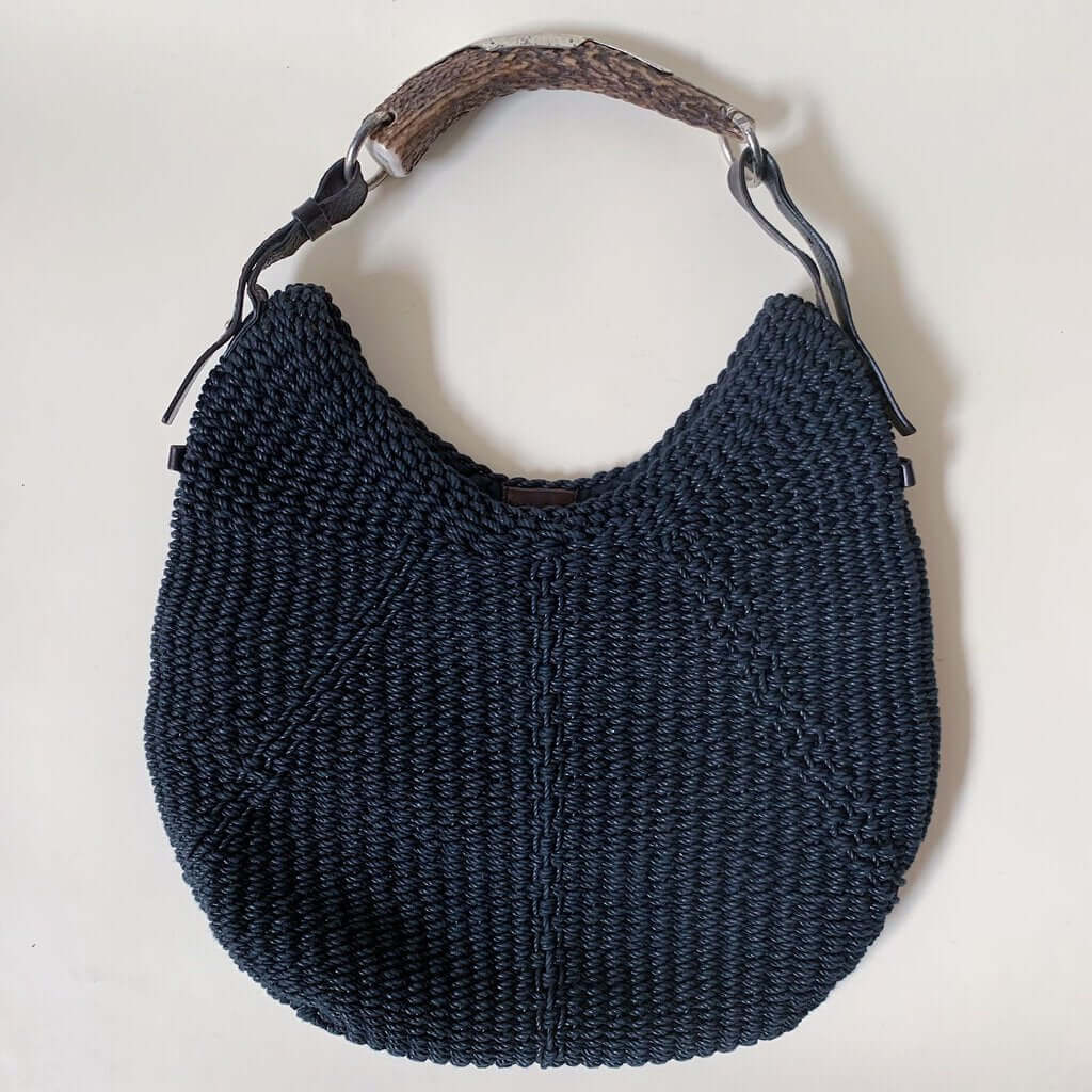 Katybird is a consignment boutique in Madrona, Seattle offering authentic YSL cardigans, blouses, dresses, cashmere, sweaters, outerwear, accessories, handbags, shoes, and much more. YSL Collab With Tom Ford Black Mombasa Woven Handbag