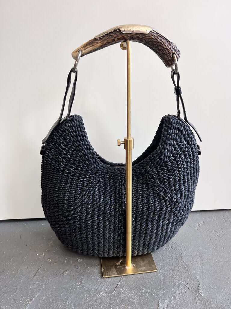 Katybird is a consignment boutique in Madrona, Seattle offering authentic YSL cardigans, blouses, dresses, cashmere, sweaters, outerwear, accessories, handbags, shoes, and much more. YSL Collab With Tom Ford Black Mombasa Woven Handbag