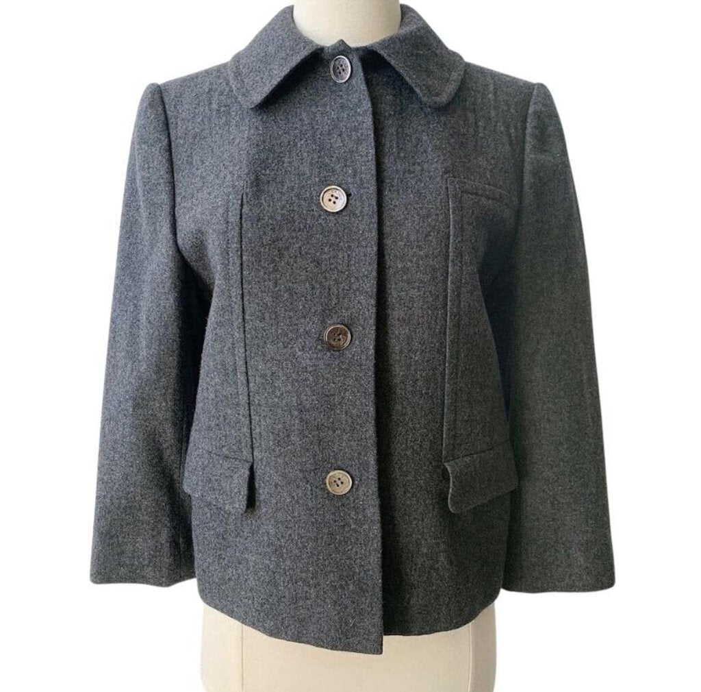 The Celine Wool Peacoat combines classic nautical style with modern sophistication, crafted from premium, warm wool for both comfort and luxury. Its double-breasted design, structured fit, and sharp tailoring make it a versatile, timeless piece that adds effortless elegance to any wardrobe.