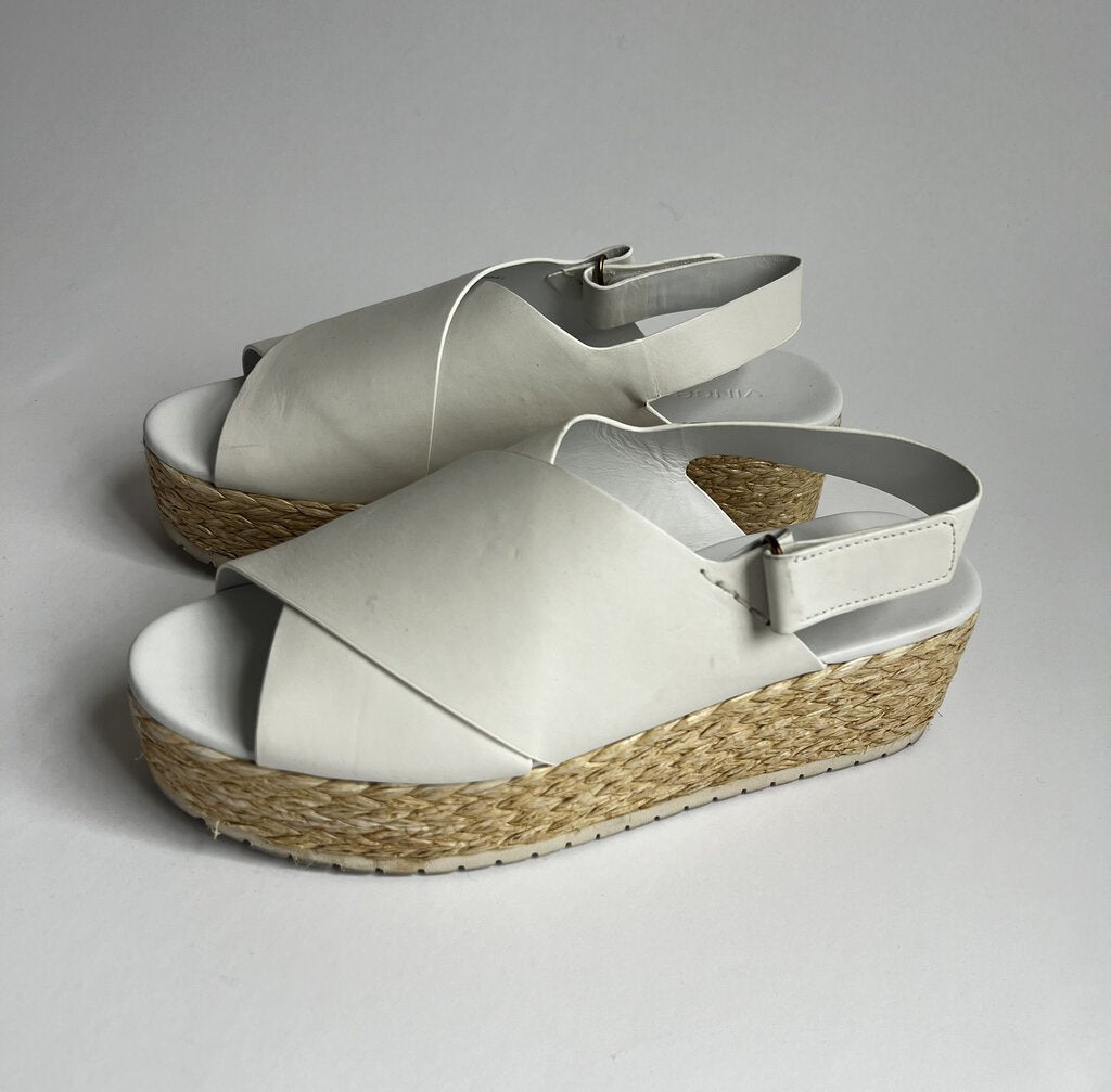 The Vince Leather Woven Flat Sandals are a stylish and versatile option for your summer wardrobe. Made from high-quality leather, these sandals feature a woven design that adds texture and visual interest. They have a flat sole for comfort and a sleek, minimalist aesthetic that pairs well with both casual and dressier outfits. These sandals are a great addition to any shoe collection.