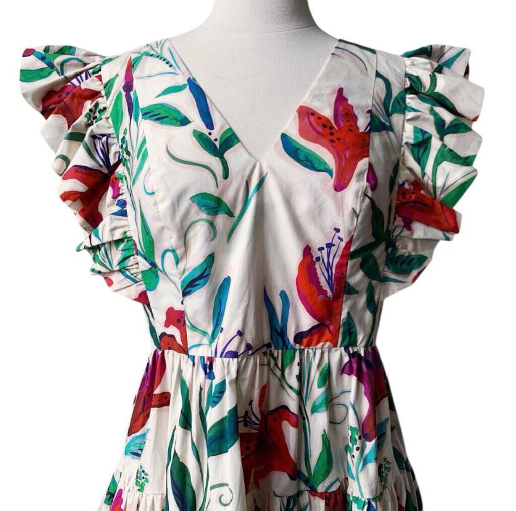 The La DoubleJ Popline Cotton Choux Dress features a playful, vibrant print in lightweight cotton, designed with a flattering, flowy silhouette and gathered waist for added shape. Its bold colors and feminine cut make it a statement piece, perfect for adding a touch of joy and style to any occasion.