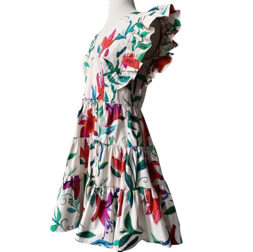 The La DoubleJ Popline Cotton Choux Dress features a playful, vibrant print in lightweight cotton, designed with a flattering, flowy silhouette and gathered waist for added shape. Its bold colors and feminine cut make it a statement piece, perfect for adding a touch of joy and style to any occasion.