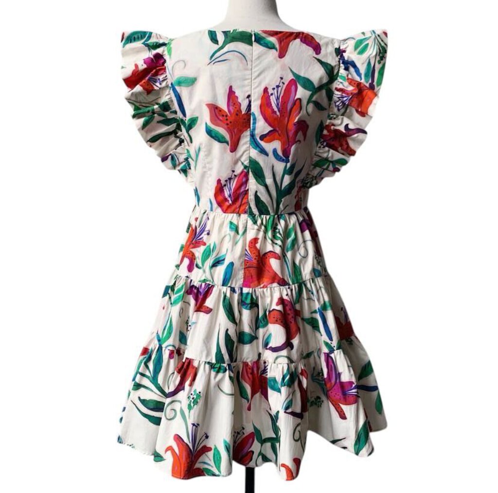 The La DoubleJ Popline Cotton Choux Dress features a playful, vibrant print in lightweight cotton, designed with a flattering, flowy silhouette and gathered waist for added shape. Its bold colors and feminine cut make it a statement piece, perfect for adding a touch of joy and style to any occasion.