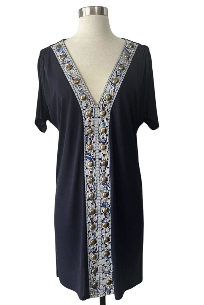 The Emilio Pucci V-Neck Bead Embellished Shift Dress combines the brand's signature vibrant prints with intricate bead detailing, creating a striking, modern take on a classic silhouette. The relaxed fit and elegant V-neckline make it a perfect choice for both daytime events and evening soirées, offering a bold yet refined look.