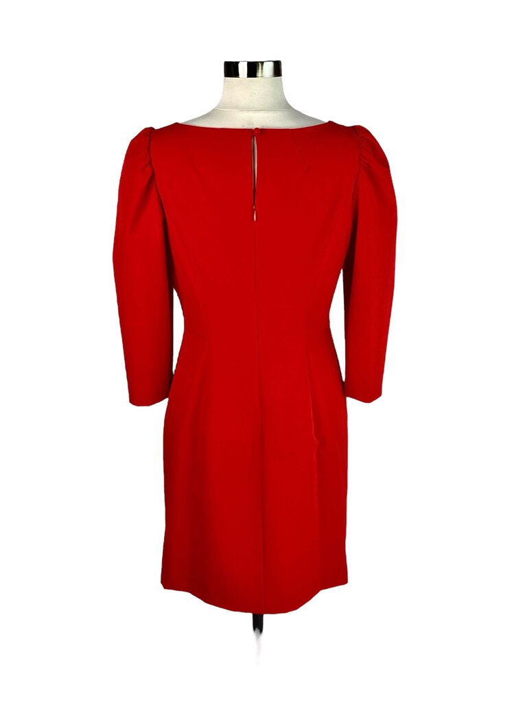 The Milly Structured Puff Sleeve Midi Dress is an elegant, fitted dress featuring bold puff sleeves and a flattering square neckline. Its midi length and structured silhouette offer a modern, sophisticated look, perfect for both formal events and stylish occasions.