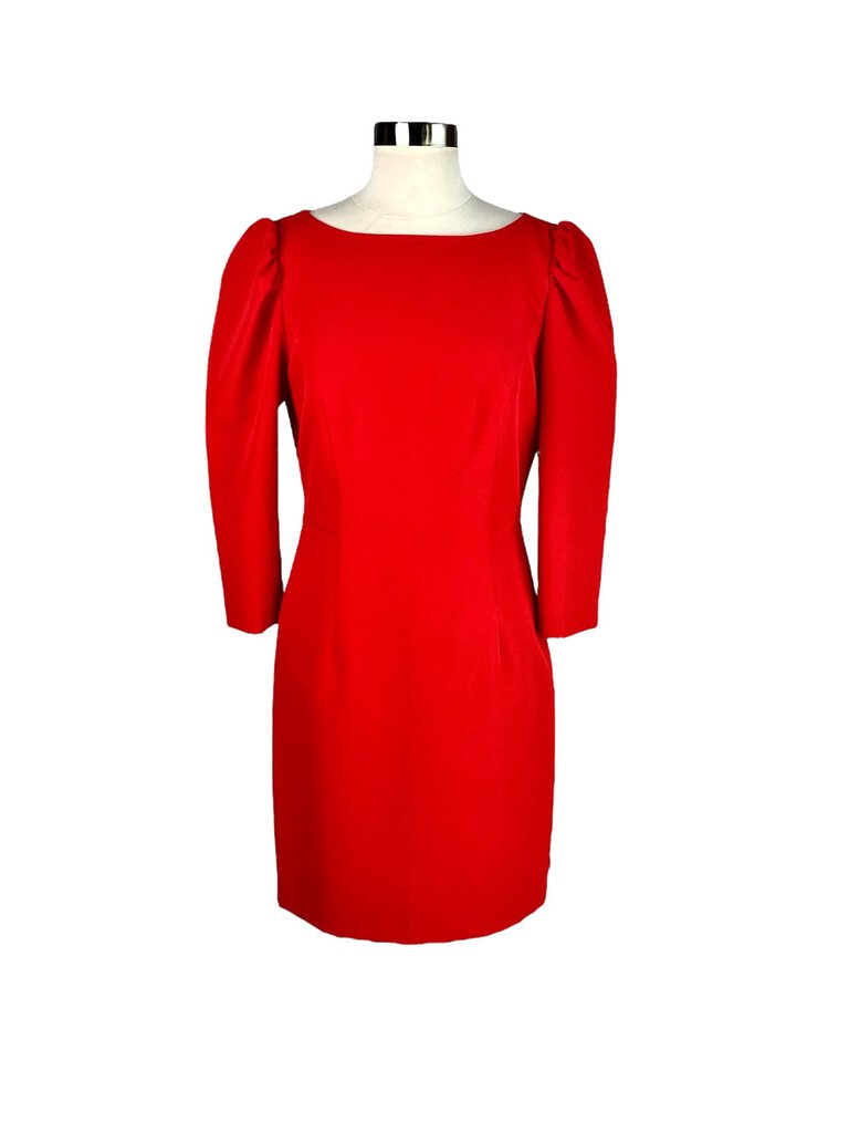 The Milly Structured Puff Sleeve Midi Dress is an elegant, fitted dress featuring bold puff sleeves and a flattering square neckline. Its midi length and structured silhouette offer a modern, sophisticated look, perfect for both formal events and stylish occasions.