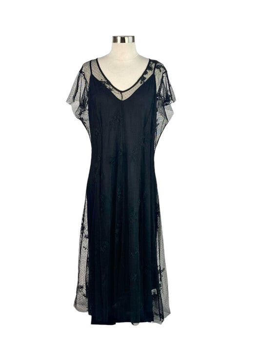 The Johnny Was Jax Midi Dress is a beautifully crafted piece, featuring vibrant prints and intricate embroidery that embody bohemian elegance. With its flattering midi length and relaxed silhouette, this dress is perfect for casual outings or more dressed-up occasions, offering comfort and style in one stunning design.