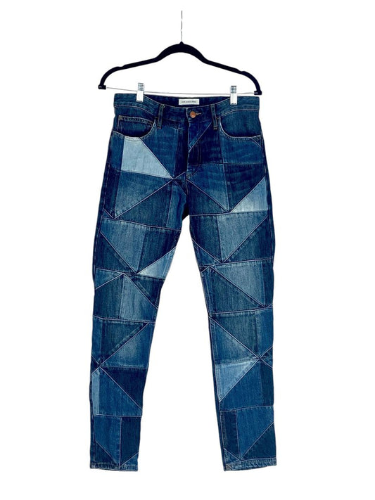 The Isabel Marant Étoile Patchwork Straight Leg Jeans are a stylish and unique take on denim, featuring a creative patchwork design that adds character and flair. With a straight leg cut, these jeans offer a flattering fit and versatility, perfect for pairing with casual tops or chic blouses for various occasions.