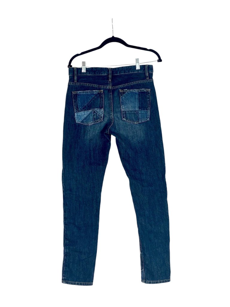 The Isabel Marant Étoile Patchwork Straight Leg Jeans are a stylish and unique take on denim, featuring a creative patchwork design that adds character and flair. With a straight leg cut, these jeans offer a flattering fit and versatility, perfect for pairing with casual tops or chic blouses for various occasions.