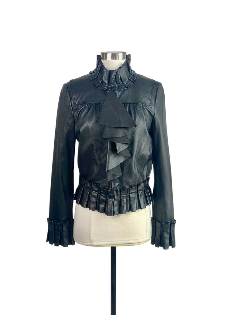 The Diane Von Furstenberg Leather Ruffle Front Zip Jacket is a striking statement piece that combines edgy leather with feminine ruffle detailing. Its tailored fit and unique design make it perfect for adding a bold touch to any outfit, whether casual or more polished.