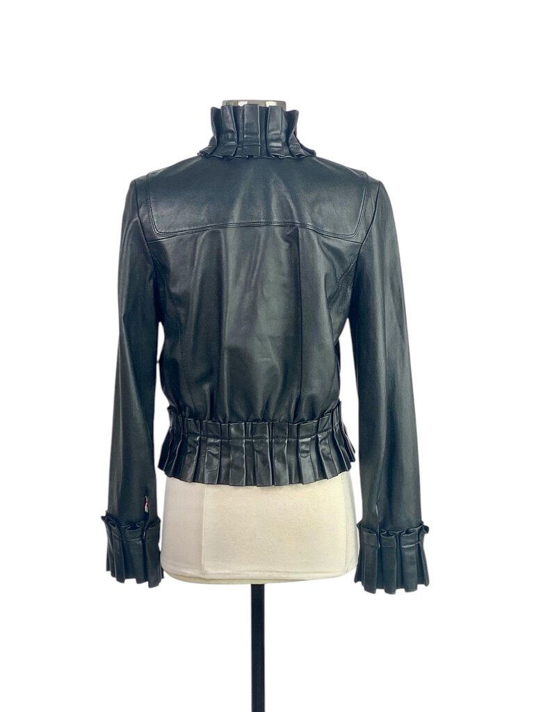 The Diane Von Furstenberg Leather Ruffle Front Zip Jacket is a striking statement piece that combines edgy leather with feminine ruffle detailing. Its tailored fit and unique design make it perfect for adding a bold touch to any outfit, whether casual or more polished.