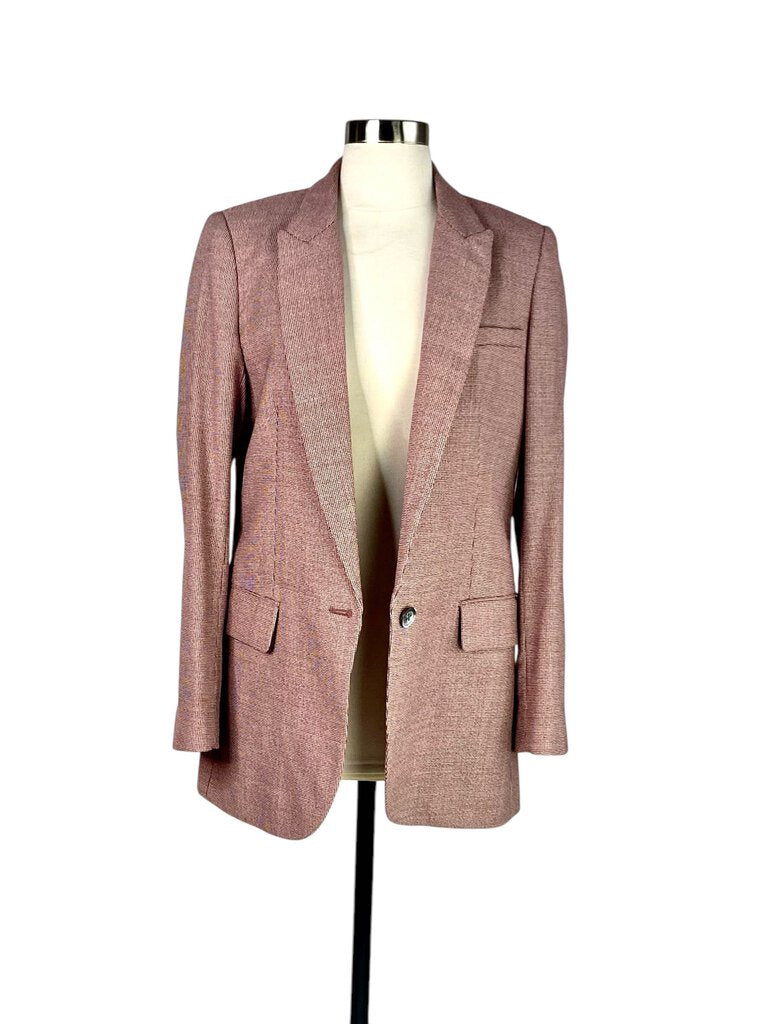 The Equipment Single Breasted Wool Blazer is a sleek, tailored piece crafted from luxurious wool, offering a clean, minimalist design that exudes timeless sophistication. Its single-breasted closure and structured silhouette make it a versatile wardrobe essential, perfect for both professional and casual settings.