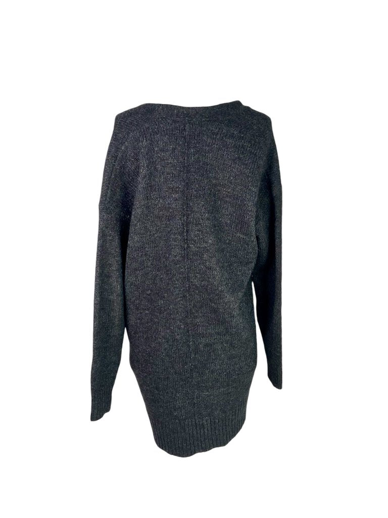 The Isabel Marant Étoile Long Line Cardigan is a cozy and stylish layering piece, crafted from soft materials with a relaxed fit. Its elongated silhouette and chic design make it perfect for adding warmth and sophistication to any outfit, whether casual or refined.