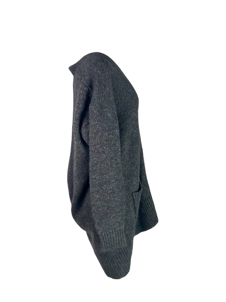 The Isabel Marant Étoile Long Line Cardigan is a cozy and stylish layering piece, crafted from soft materials with a relaxed fit. Its elongated silhouette and chic design make it perfect for adding warmth and sophistication to any outfit, whether casual or refined.