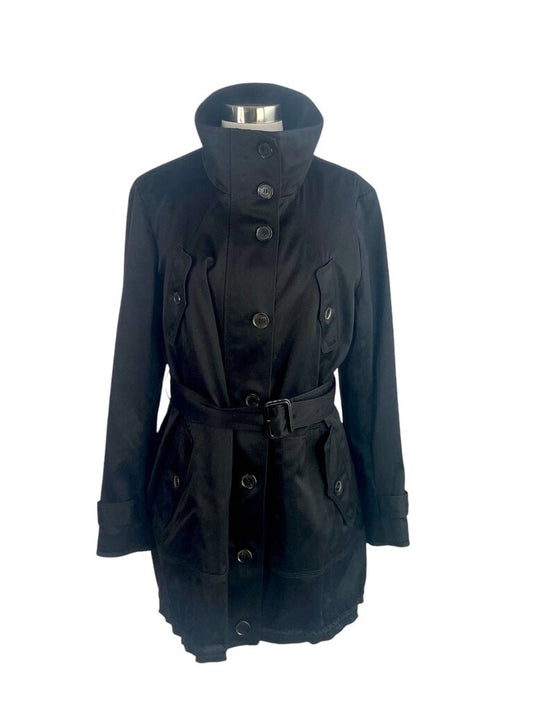 The Burberry Satin Belted Car Coat with Liner is a luxurious and sophisticated outerwear piece, featuring a sleek satin finish and a stylish belt that enhances the silhouette. With its detachable liner, this coat offers versatility for different weather conditions, making it an elegant choice for both casual and formal occasions.