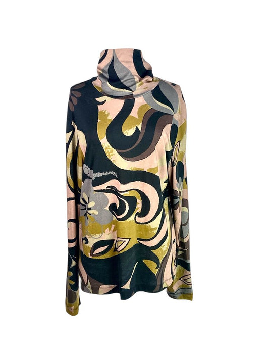 The Dries Van Noten Graphic Print Cotton Turtleneck is a bold and artistic statement piece, showcasing eye-catching graphics on soft cotton fabric. Its fitted turtleneck design offers both comfort and style, making it a versatile addition to any wardrobe, perfect for layering or wearing on its own.