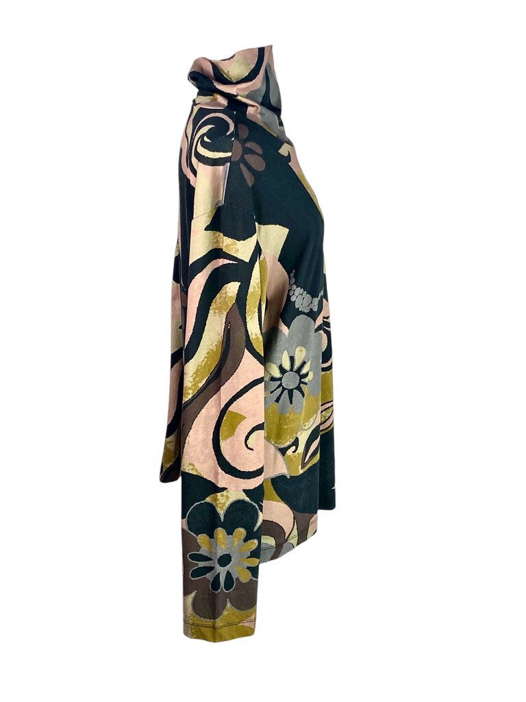 The Dries Van Noten Graphic Print Cotton Turtleneck is a bold and artistic statement piece, showcasing eye-catching graphics on soft cotton fabric. Its fitted turtleneck design offers both comfort and style, making it a versatile addition to any wardrobe, perfect for layering or wearing on its own.