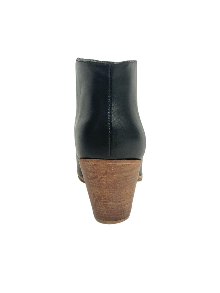 The Hollywood Trading Company Gwen Ankle Bootie is a stylish and edgy choice, featuring a sleek design with unique detailing that adds character. Crafted from high-quality materials, these booties offer both comfort and versatility, making them perfect for elevating casual outfits or adding flair to more polished looks.