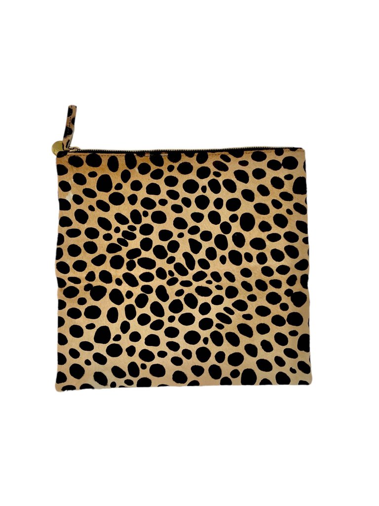 The Clare V Leopard Foldover Clutch Bag is a stylish statement piece, featuring a bold leopard print that adds a touch of fun to any outfit. Its foldover design offers versatility, allowing it to be worn as a clutch or a crossbody, making it perfect for both casual outings and dressy events.