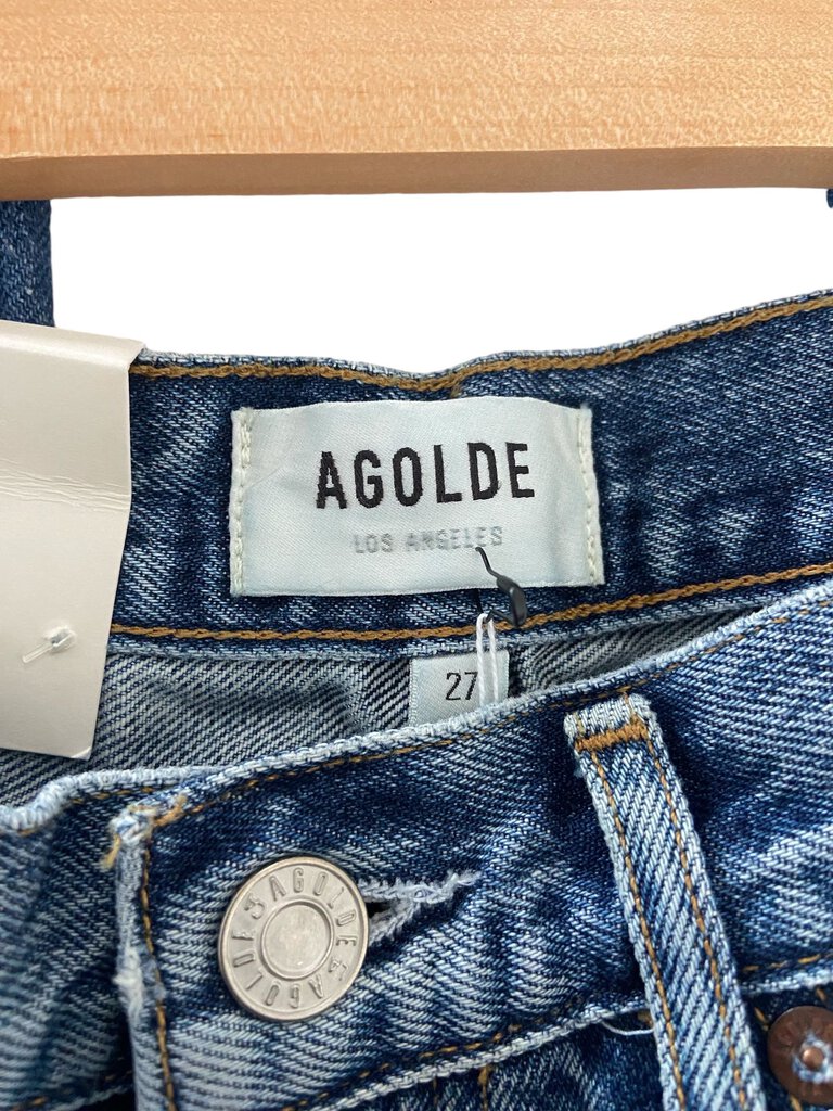 The Agolde 'Lana' Mid Rise Jeans are a stylish and flattering option, featuring a classic mid-rise fit that enhances the silhouette. Crafted from high-quality denim with a modern, slightly relaxed cut, these jeans offer both comfort and versatility, making them ideal for everyday wear.