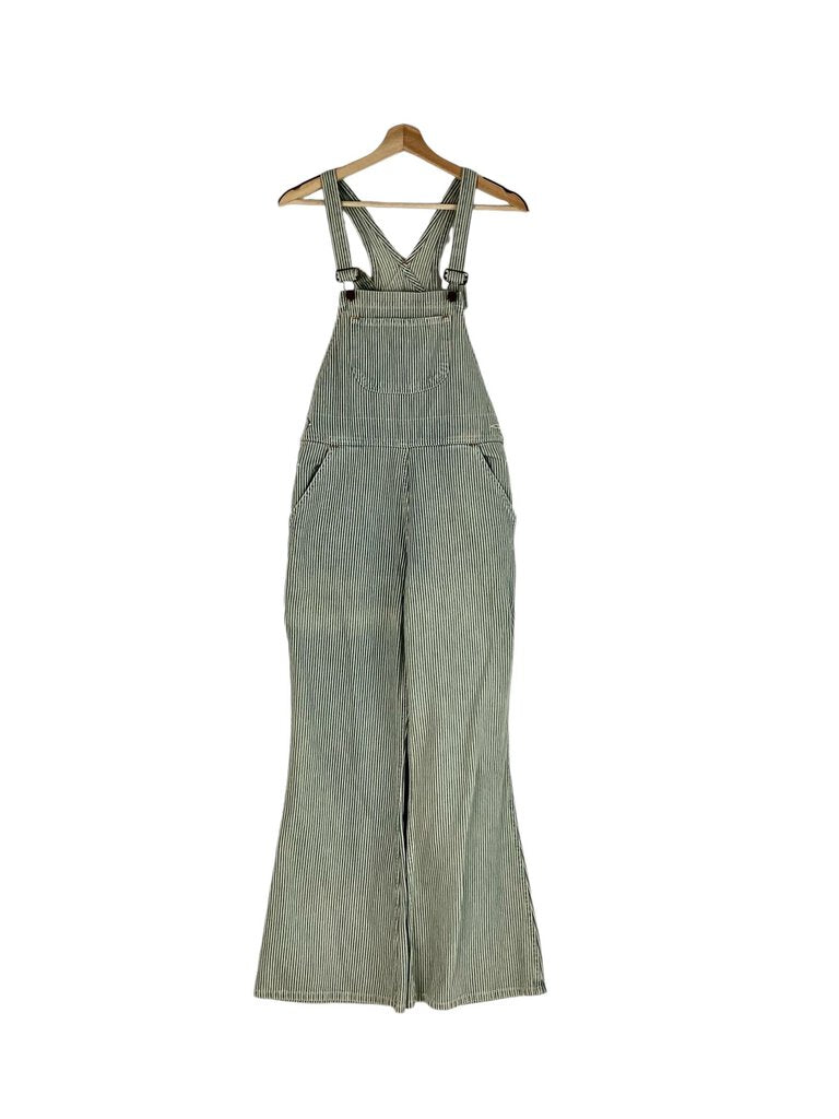 The Christy Dawn Railroad Stripe Overalls are a charming and sustainable piece, crafted from soft, eco-friendly fabric with a classic railroad stripe pattern. Their relaxed fit and adjustable straps provide comfort and style, making them perfect for casual outings or laid-back days.