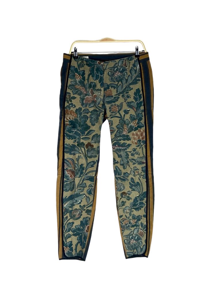 The Dries van Noten Floral Stripe Color Block Pants are a bold and artistic piece, showcasing a vibrant mix of floral patterns and striking color blocks. With their relaxed fit and unique design, these pants make a statement while offering versatility for both casual and dressed-up looks.