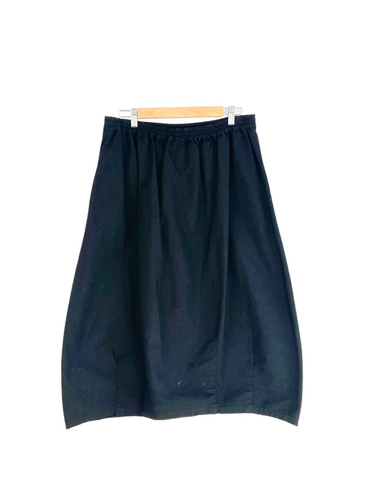 The Hannoh Wessel Drawstring Utility Skirt is a stylish and functional piece, featuring a relaxed fit and practical drawstring waist for adjustable comfort. Crafted from high-quality materials, this skirt combines utility with modern design, making it perfect for both casual outings and elevated looks.