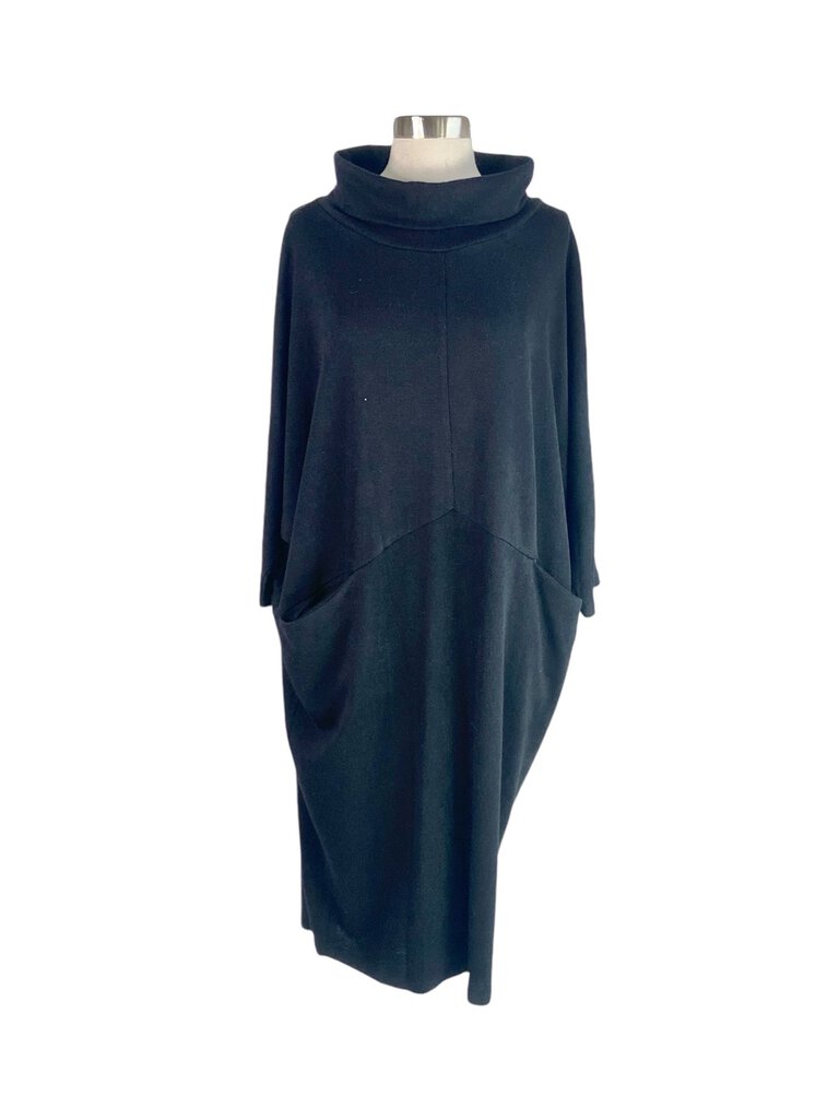 The Ayrtight Dolman Sweatshirt Dress is a cozy and chic piece, featuring a relaxed dolman silhouette that drapes beautifully. Crafted from soft fabric, this dress combines comfort with style, making it perfect for casual outings or lounging while still looking effortlessly put together.