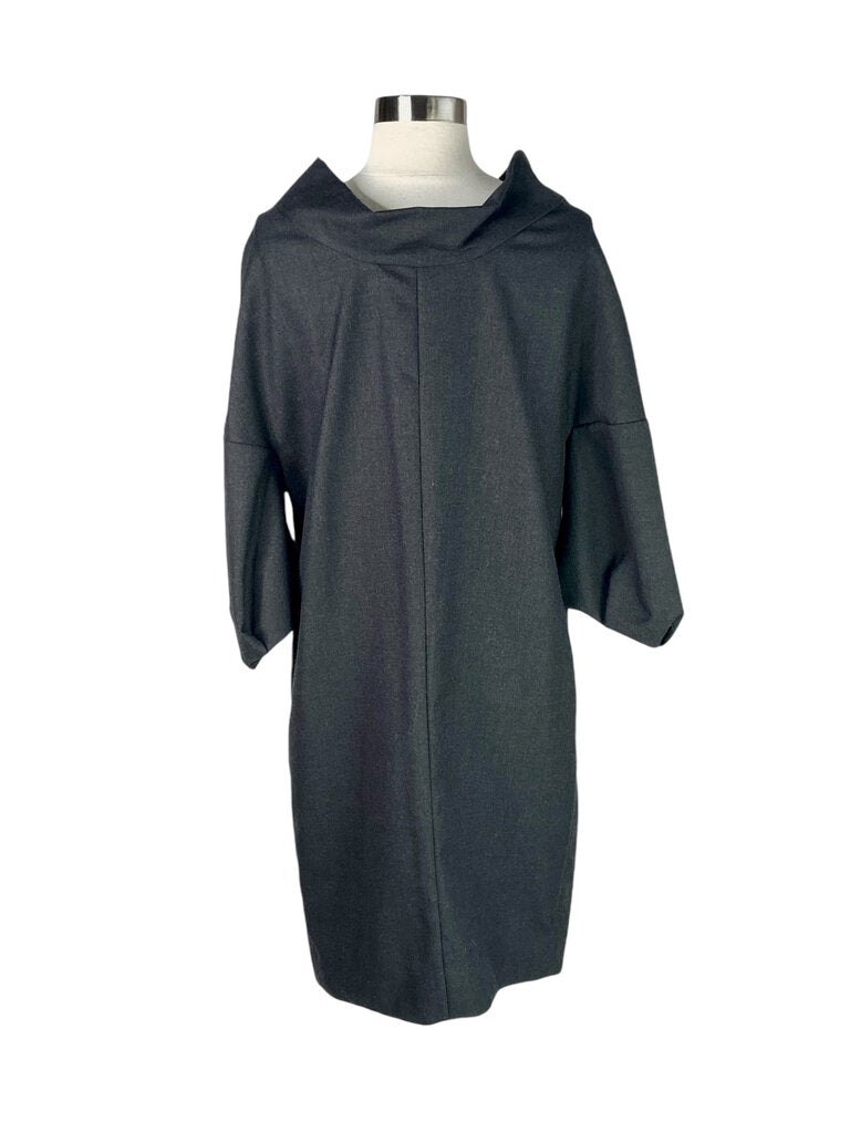 The Marni Zip Exposed Zipper Front Wool Dress is a striking blend of modern design and classic elegance, featuring an exposed zipper that adds an edgy touch to its sophisticated silhouette. Crafted from high-quality wool, this dress offers both comfort and style, making it a standout choice for any occasion.