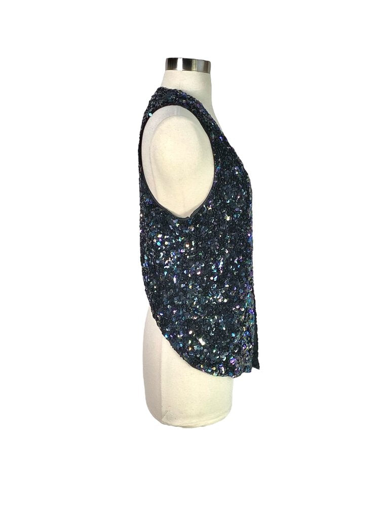 The Gryphon Sequined Vest adds a touch of bold glamour to any outfit, featuring a sleek, tailored fit and an all-over sequin design that catches the light with every movement. This versatile piece can be dressed up for evening events or layered over casual looks for a stylish, statement-making touch.