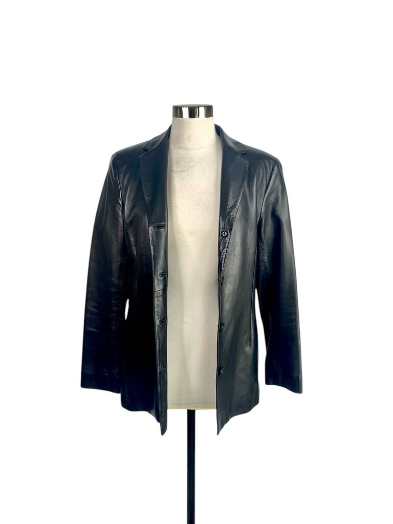 The Coach Leather Jacket is a timeless piece that combines classic style with modern craftsmanship, featuring soft, high-quality leather for a luxurious feel. Its sleek silhouette and versatile design make it perfect for adding an edgy touch to any outfit, whether casual or more polished.