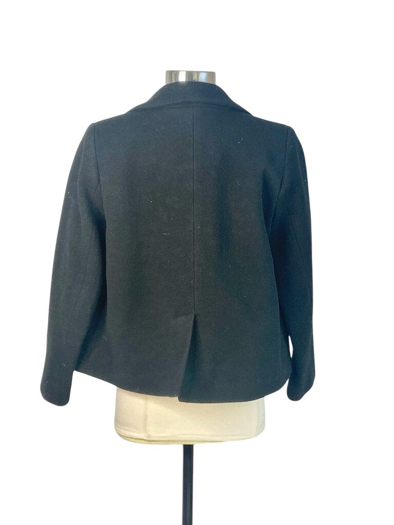 The Rachel Comey Fleece Lined Cropped Wool Jacket is a stylish and cozy outerwear piece, featuring a cropped silhouette and soft fleece lining for added warmth. Its modern design and unique detailing make it perfect for layering over both casual and elevated outfits.