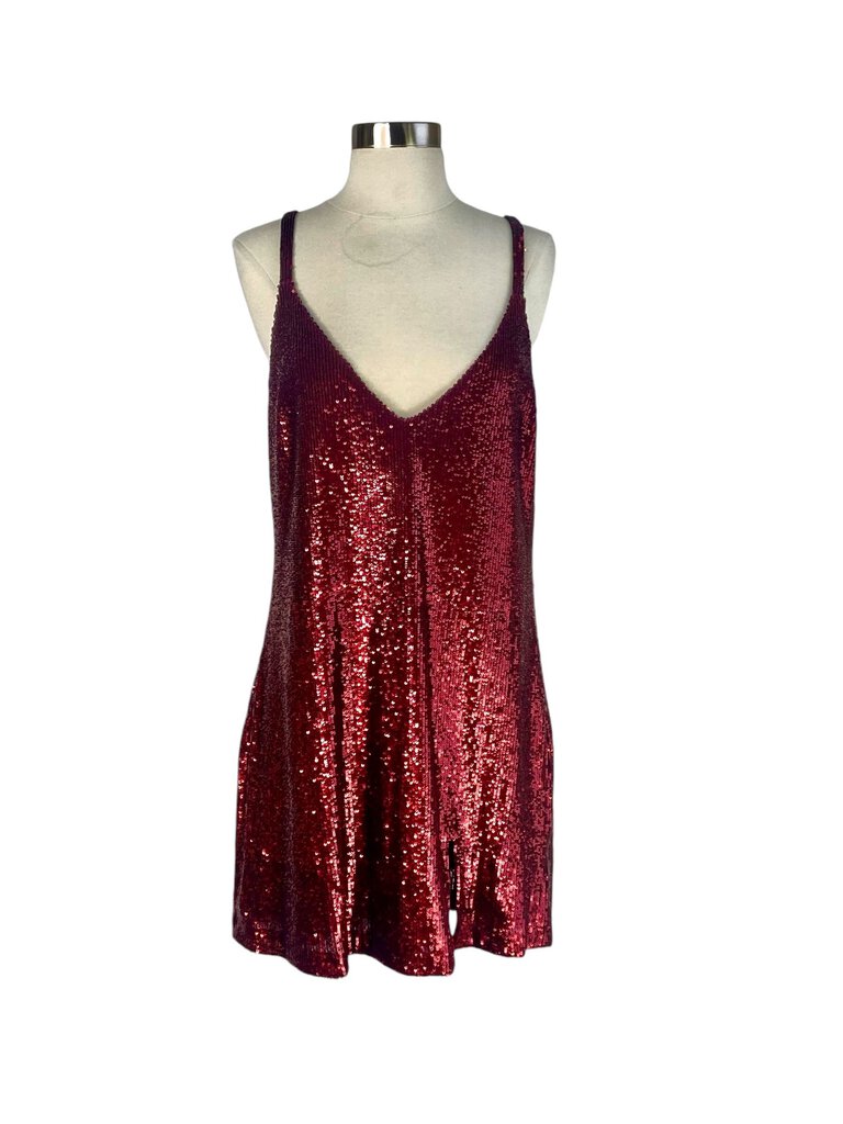 The Reformation Sequin 'Jimmy' Mini Dress is a dazzling, fitted design that features a shimmering sequin fabric, perfect for adding sparkle to any evening event. With its flattering silhouette and bold, eye-catching details, it combines glamour with a playful, modern edge.