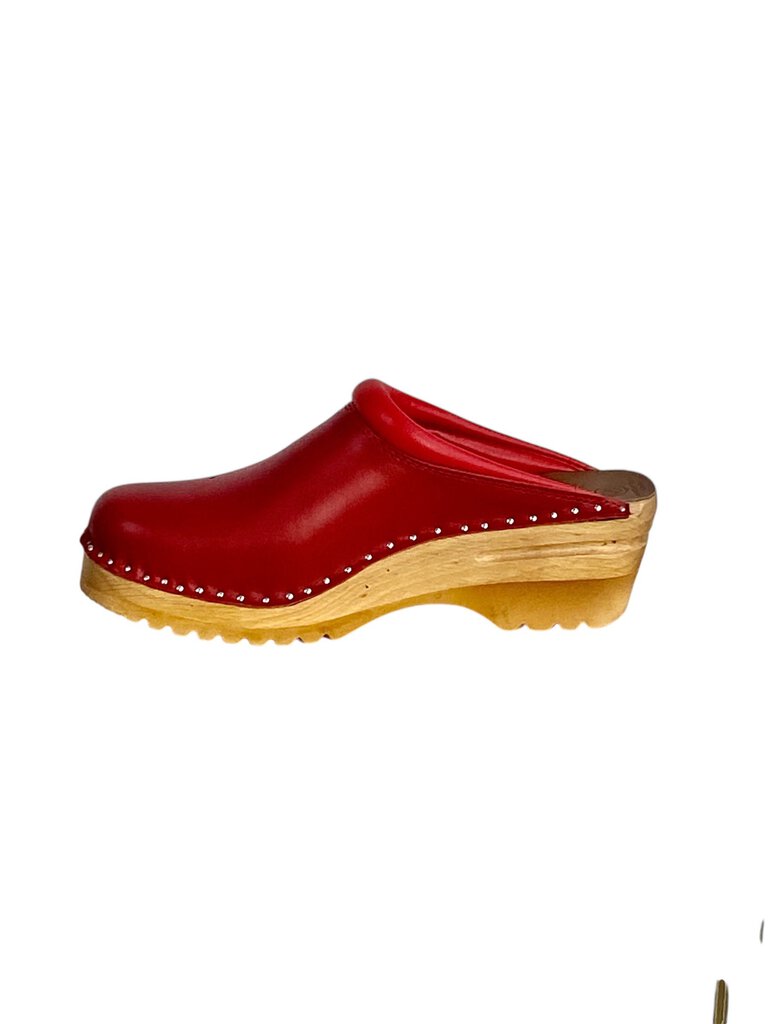 The Troentorps 'O'Keefe' Cutwork Clogs combine traditional craftsmanship with modern design, featuring intricate cutout details and a comfortable wooden base. With their versatile style and sturdy construction, these clogs offer both a chic aesthetic and lasting comfort for everyday wear.