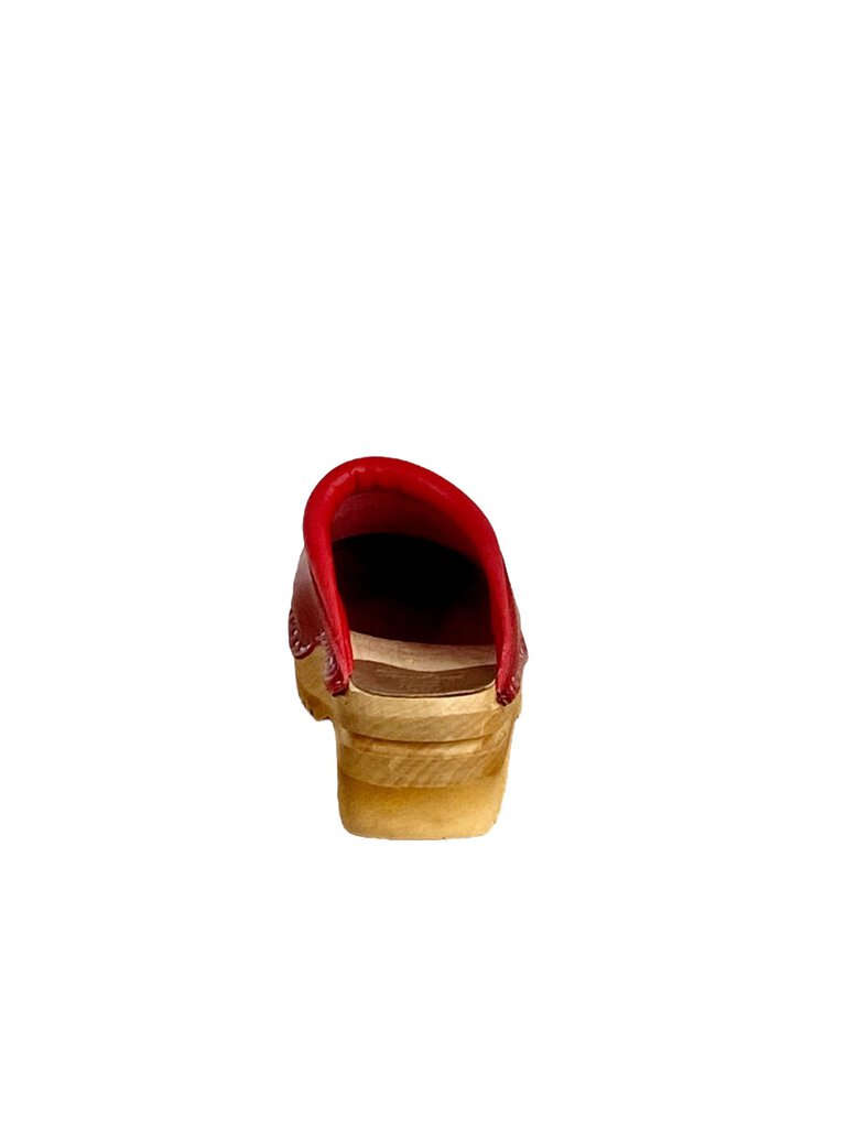 The Troentorps 'O'Keefe' Cutwork Clogs combine traditional craftsmanship with modern design, featuring intricate cutout details and a comfortable wooden base. With their versatile style and sturdy construction, these clogs offer both a chic aesthetic and lasting comfort for everyday wear.