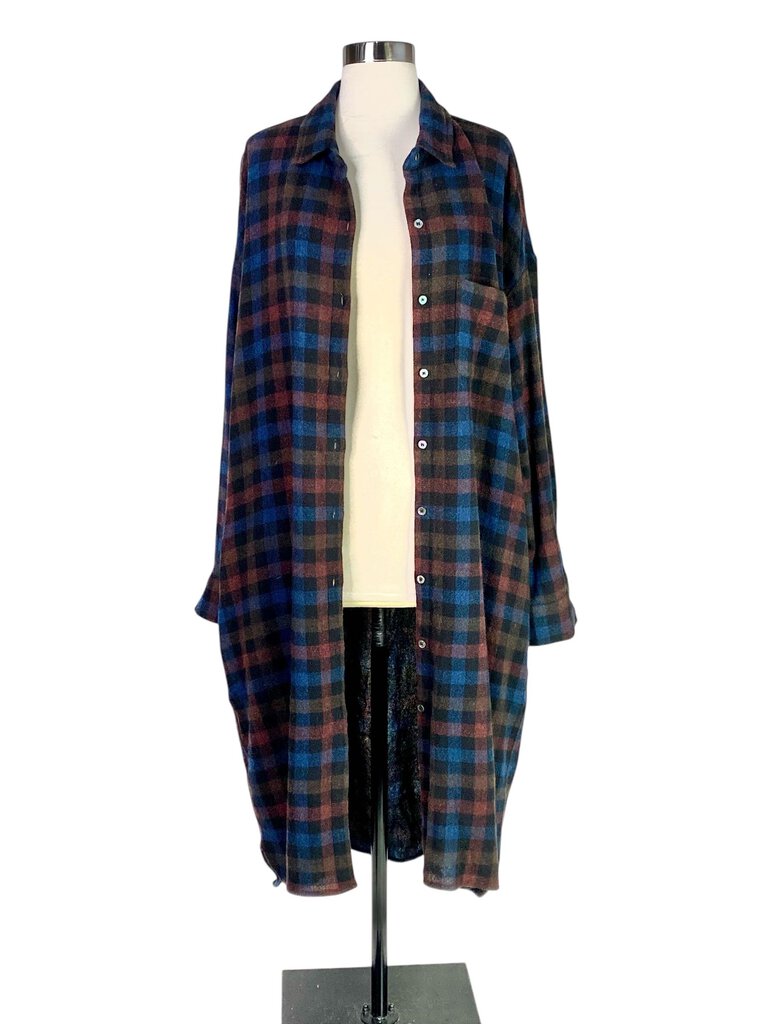 The 6397 Buffalo Plaid Flannel Shirt Dress combines the timeless charm of a classic plaid pattern with the relaxed, effortless style of a shirt dress. Crafted from soft flannel, it features a button-down front and a slightly oversized fit, making it perfect for casual, laid-back days or layering over leggings.