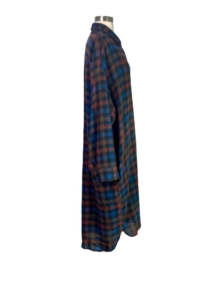 The 6397 Buffalo Plaid Flannel Shirt Dress combines the timeless charm of a classic plaid pattern with the relaxed, effortless style of a shirt dress. Crafted from soft flannel, it features a button-down front and a slightly oversized fit, making it perfect for casual, laid-back days or layering over leggings.