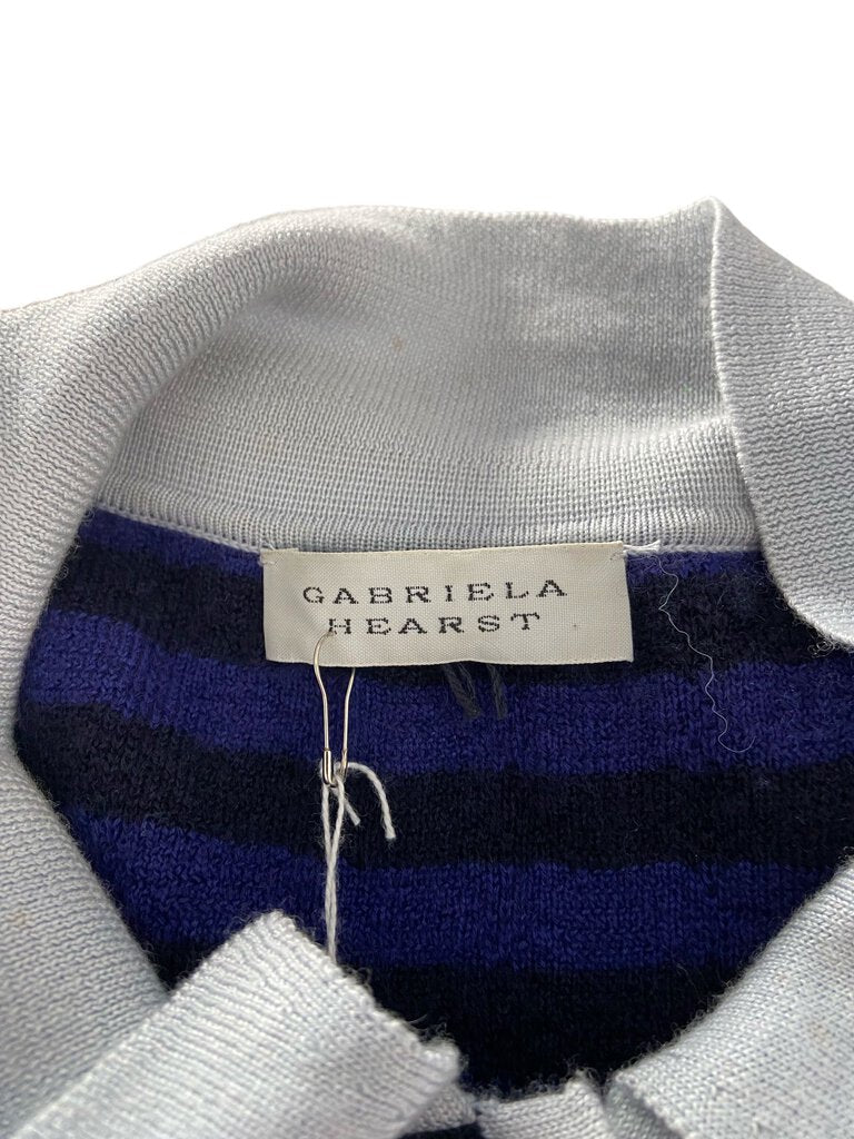 The Gabriela Hearst Basketweave Cashmere Polo Sweater Dress combines luxury and comfort with its intricately woven cashmere fabric and flattering polo collar design. This elegant, versatile piece is perfect for both casual and more polished looks, offering warmth without compromising on style.