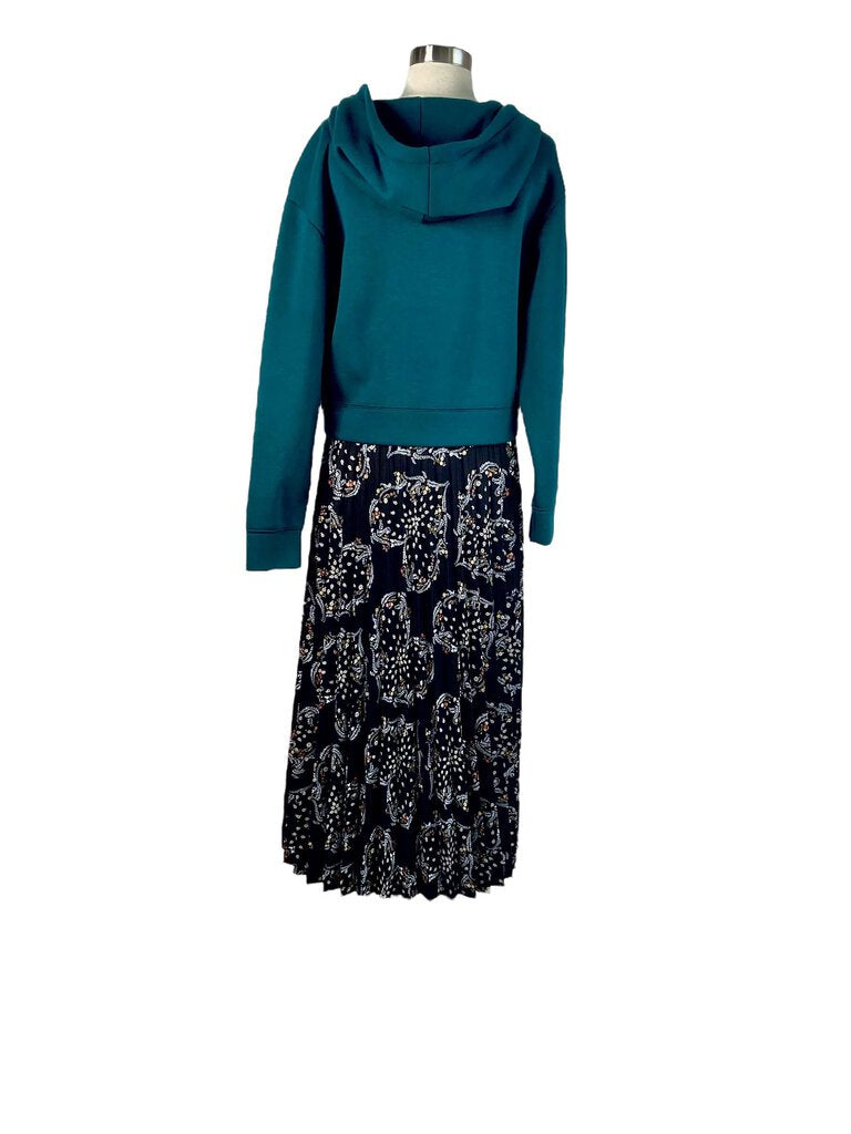 The Sandro Mixed Media Hoodie Pleated Maxi Dress combines casual and sophisticated elements with its relaxed hoodie top and flowing pleated skirt. Crafted from a blend of fabrics, this dress offers a unique fusion of street style and elegant design.