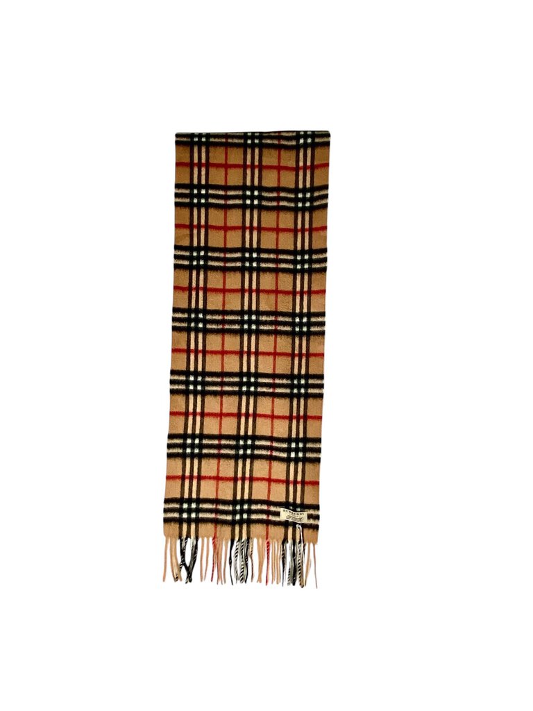 The Burberry Plaid Cashmere Scarf is a timeless accessory, crafted from ultra-soft cashmere and featuring the brand's iconic check pattern. Its luxurious feel and classic design make it a versatile piece that adds warmth and sophistication to any outfit.