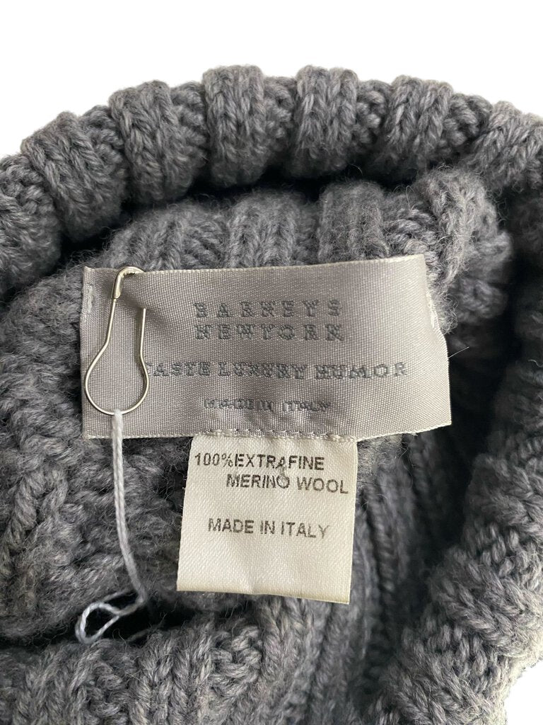 The Barneys Wool Cable Knit Turtleneck Sweater is a cozy, classic piece crafted from rich wool with intricate cable knit detailing. Its warm turtleneck design and textured pattern make it an elegant yet comfortable addition to any winter wardrobe.