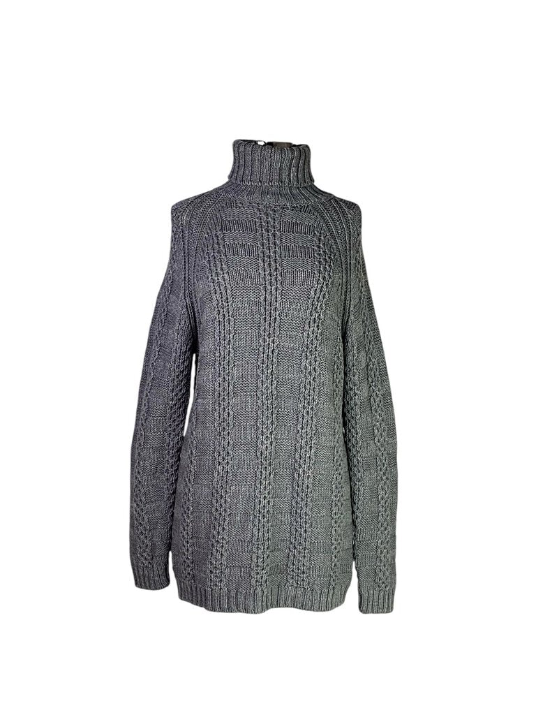 The Barneys Wool Cable Knit Turtleneck Sweater is a cozy, classic piece crafted from rich wool with intricate cable knit detailing. Its warm turtleneck design and textured pattern make it an elegant yet comfortable addition to any winter wardrobe.