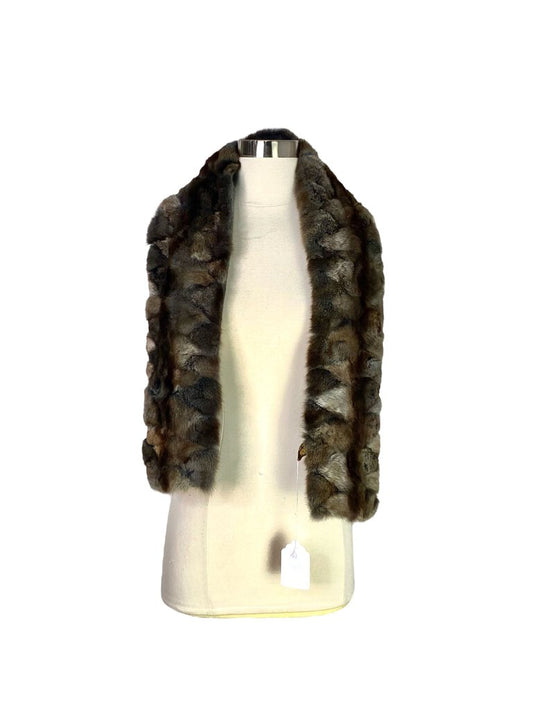 The Loro Piana Fur & Cashmere Scarf is a luxurious accessory, expertly crafted from a blend of soft cashmere and sumptuous fur for ultimate warmth and elegance. Its refined design and plush texture make it the perfect statement piece to elevate any winter outfit.