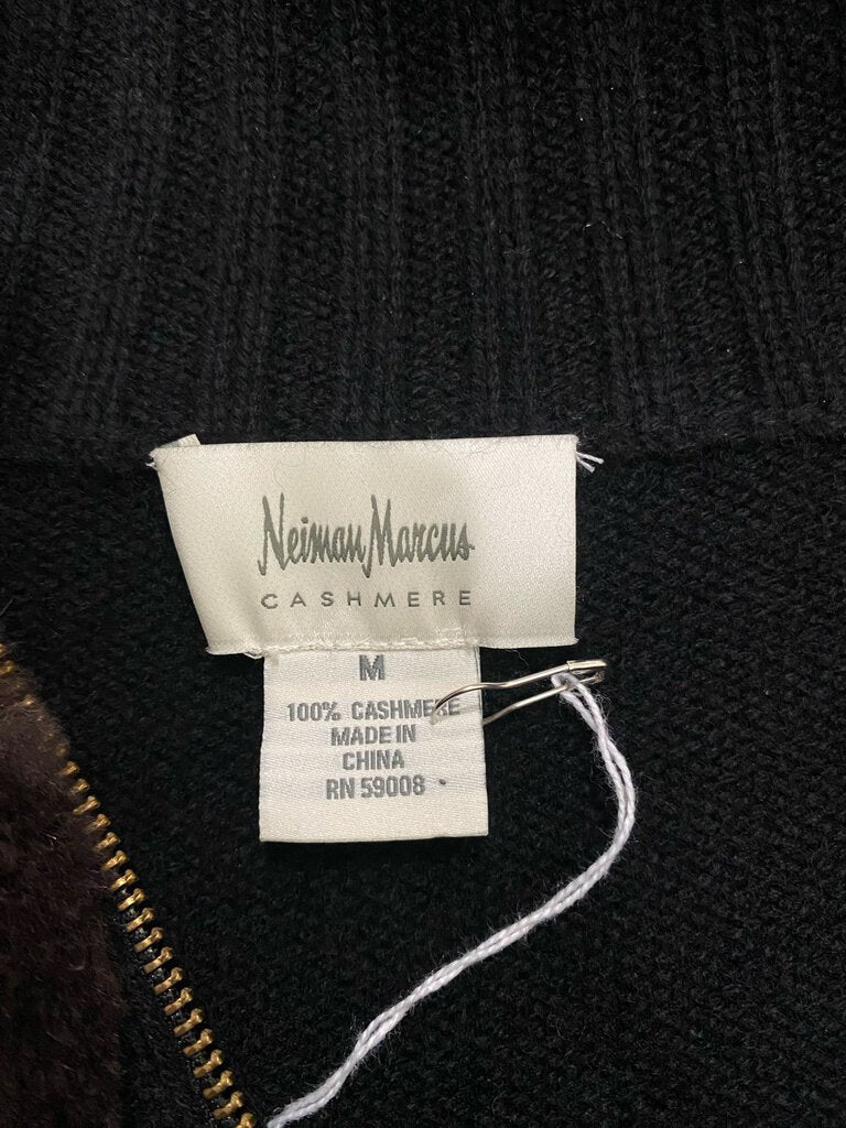 The Neiman Marcus Cashmere/Fur Zip Front Jacket Sweater offers a luxurious fusion of soft cashmere and plush fur accents, creating an elegant and cozy piece. With its zip-front design and relaxed fit, it provides both warmth and sophistication, making it perfect for layering over casual or refined outfits.