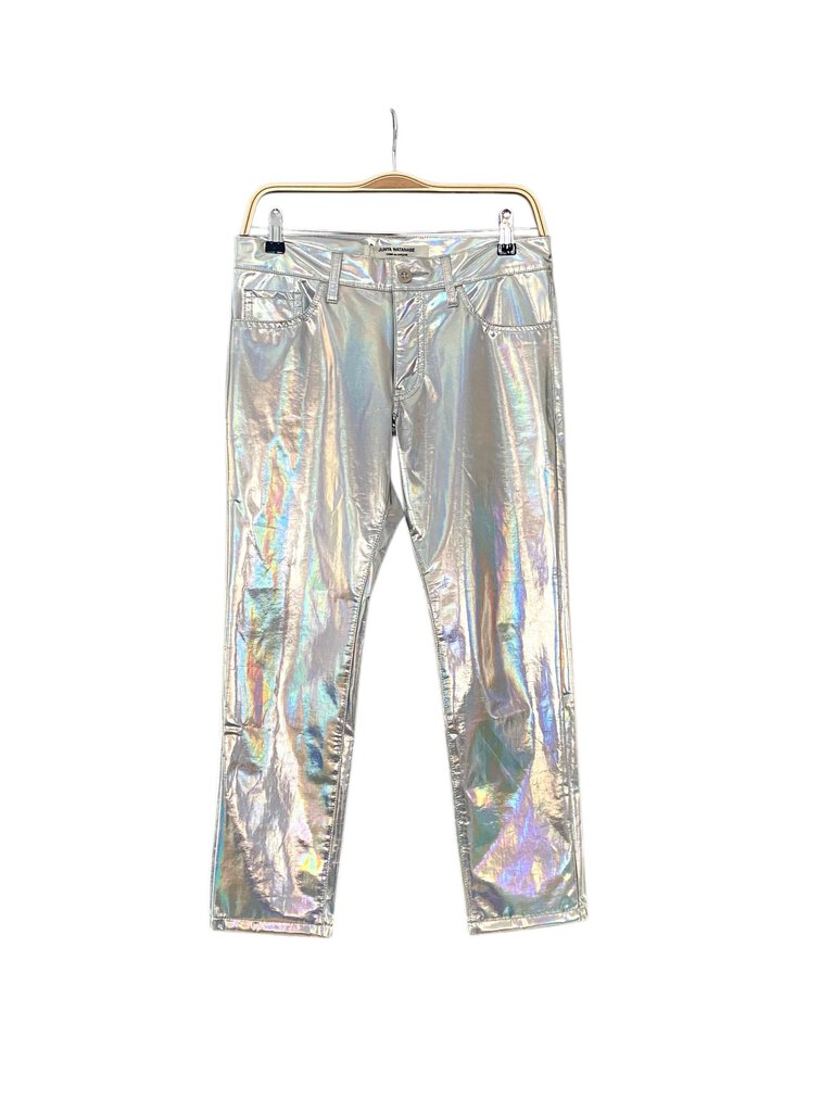 The Junya Watanabe Holographic Jeans make a bold fashion statement with their reflective, futuristic fabric and sleek, tailored fit. Blending avant-garde design with street-style edge, they offer a unique and daring twist on classic denim.